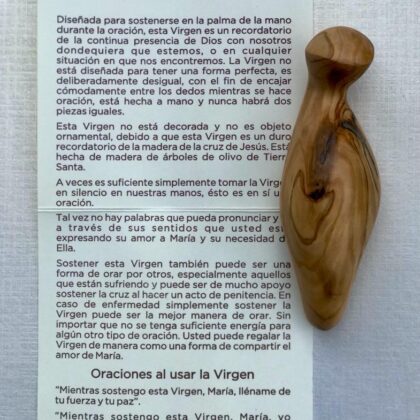 Virgen en la mano