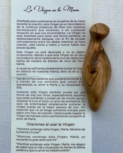 Virgen en la mano